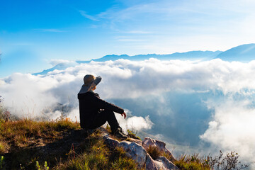man on top of mountain