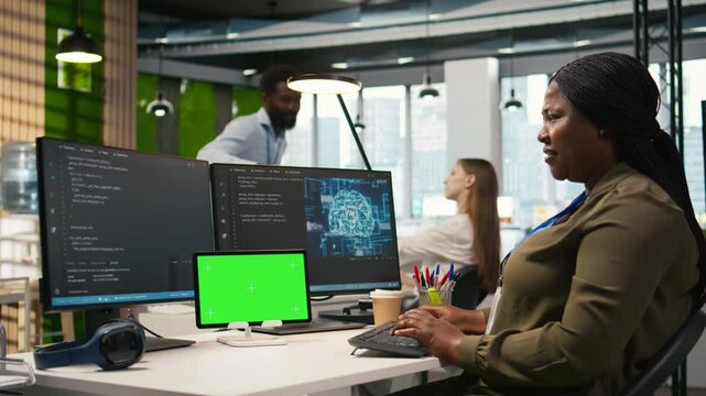 Admin using isolated screen tablet to code AI algorithms debugging software issues and improving system stability. Tech startup office worker using chroma key device, configuring settings, camera A