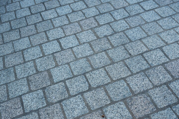 rue pavée sur une place de ville en grés