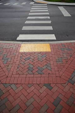 Brick pavers leading up to ADA crosswalk