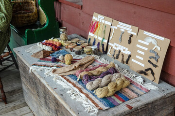 Hand Carved Spoons on Porch Rail