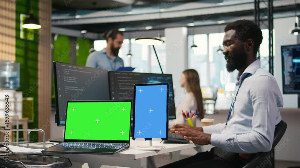 Poster startup office admin reviewing ai system metrics on isolated screen devices, monitoring performance 