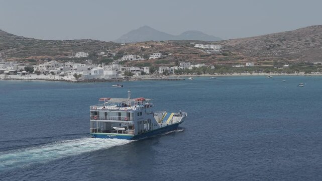 Ferry boat arriving in Pollonia, Milos Greece. 3x telephoto lens. D-Log M professional footage