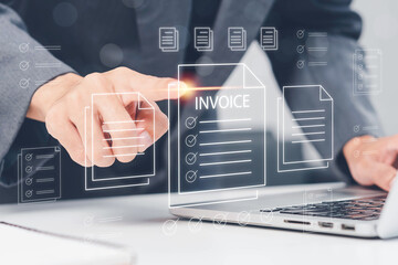 E-Invoice and Digital billing concept, Invoice, Businessman using laptop to manage electronic statements virtual screen. E-tax, Digital receipt, Online invoice processing and tax accounting solutions.