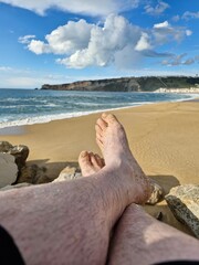 feet on the beach
