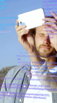 Holding smartphone and taking selfie, couple over programming code animation