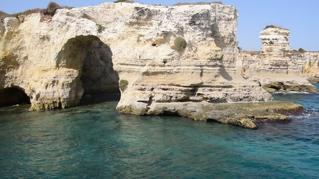 Natural arch and turquoise water