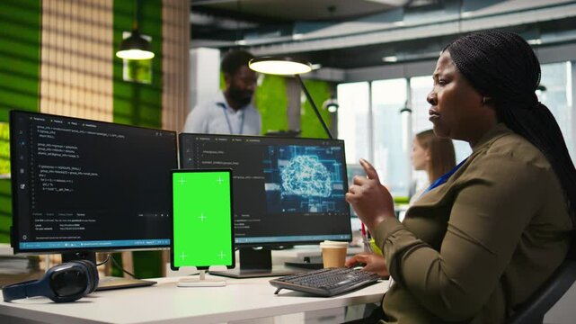Admin writing code on isolated screen tablet, developing machine learning APIs. IT specialist using chroma key device to troubleshoot software errors using artificial intelligence, camera A