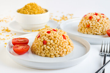 Traditional local bulgur pilaf from the Mardin city of Turkey.Designed in white plates