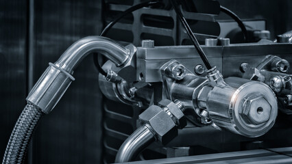 large metalworking machine with hydraulic or pneumatic drive pipes with many parts, industrial...