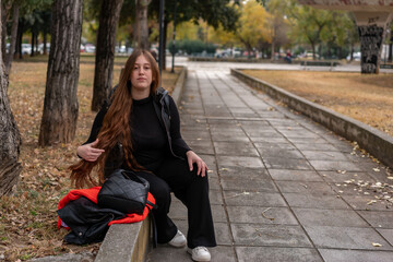Fototapeta premium Unedited Portrait of a Young Woman Walking in the City – Facial Expressions Showing Various Emotions