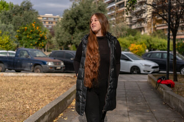 Unedited Portrait of a Young Woman Walking in the City – Facial Expressions Showing Various Emotions