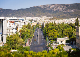 Looking out at the boulevard and mountains in Athens, Greece