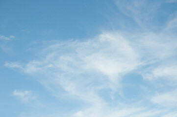 Obraz premium white clouds in the blue sky.