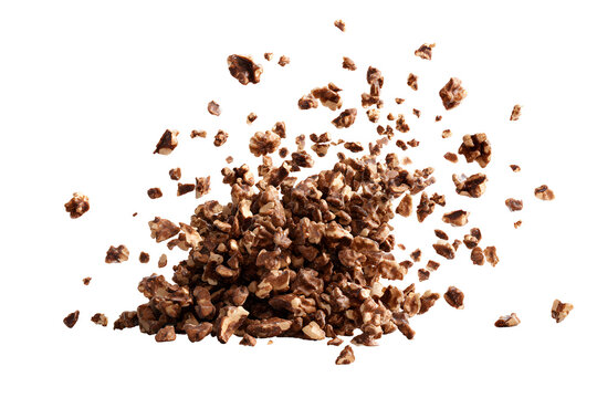 Flying crushed pecans with high speed motion effect isolated on transparent background