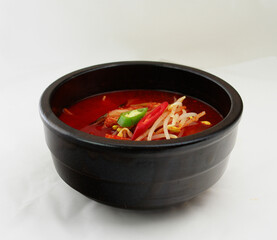 Traditional Korean Kimchi Soup in Black Stone Pot