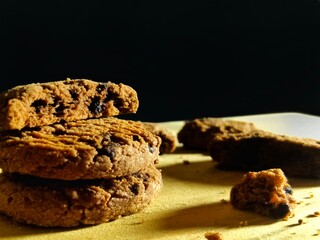 Chocolate Cookies on Wooden Surface with Shadows
