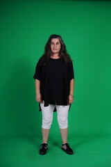 Unedited Portrait of Woman’s Face Expressing Various Emotions – Green Studio Background