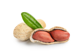 Unpeeled and peeled peanuts with leaf on white background