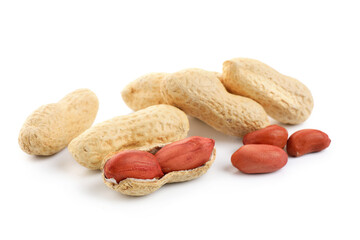 Unpeeled and peeled peanuts on white background