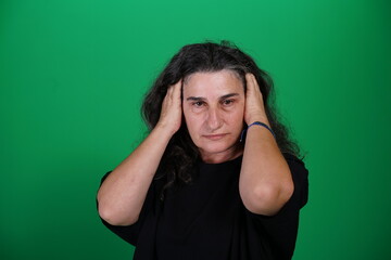 Unedited Portrait of Woman&rsquo;s Face Expressing Various Emotions &ndash; Green Studio Background