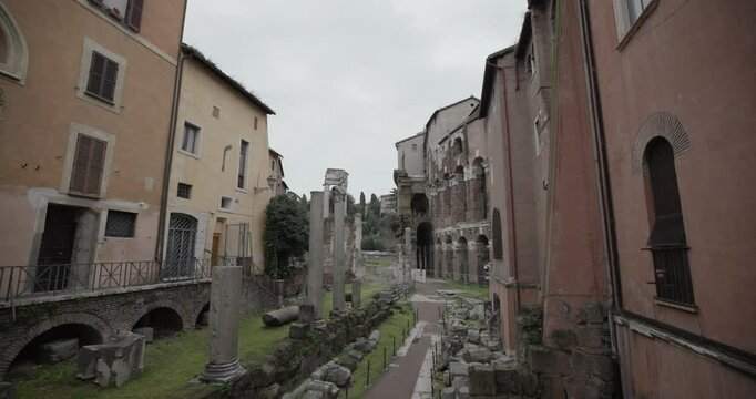 Ghetto Ruins in Rome, Italy in the Jewish Ghetto on Via del Foro Piscario with view of Marcello Theatre and Temples of Apollo Sosiano and Bellona. Floating Handheld SloMo Shot