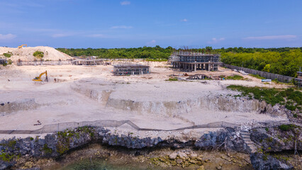 the construction site of a luxury complex, 5 stars, on the shore of a tropical island