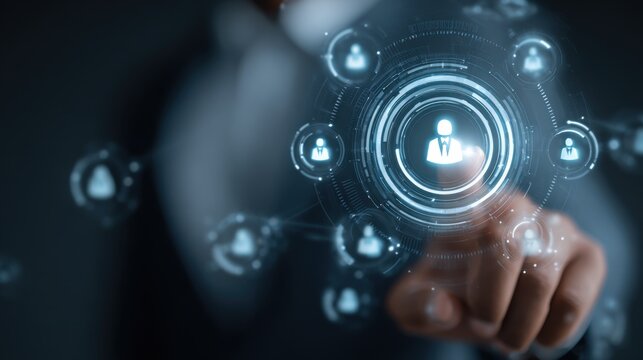 A person interacts with a digital interface displaying human icons and network connections, symbolizing technology and business networking.