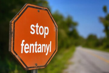 Close-up shot of octagon stop sign with 'Stop Fentanyl' text fentanyl promoting drug awareness