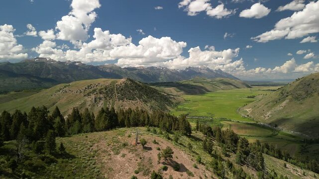 Aerial of Bridger Tetons and mountain valleys in Jackson Wyoming in summer
