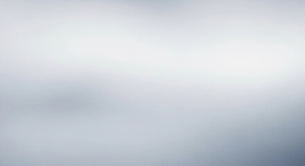 Abstract soft focus image with a gradient of white and blue-gray, creating a dreamy, ethereal effect.