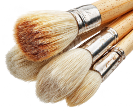 Close-up of several used paintbrushes