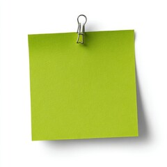 A lime-green sticky note hangs from a small metallic clip against a stark white backdrop