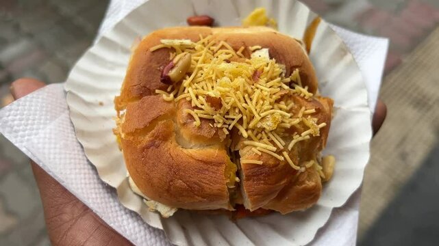 Mumbai style Vada pav sold in the streets of India.