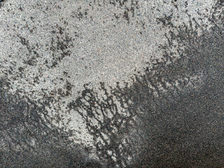 wet gray asphalt road after the rain. rainy weather background. high resolution.