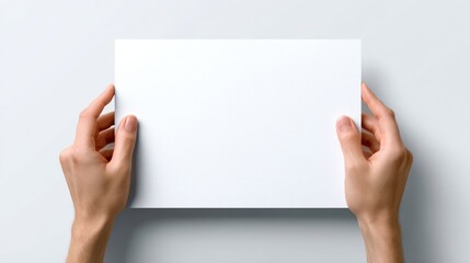 Realistic human hands presenting a blank white sheet forward toward the viewer, full visibility of the paper, isolated on clean white background for branding or message mockup
