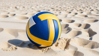 A blue, yellow, and white volleyball sits on a sandy beach, with footprints visible in the background.