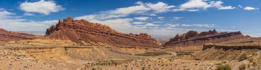 Spotted Wolf Canyon panorama with blue sky and scattered clouds