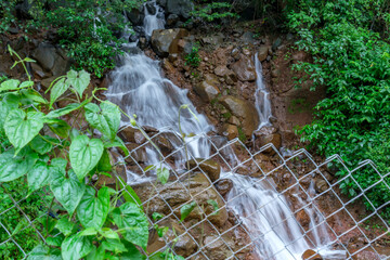 A waterfall during the monsoons near Pune India. Monsoon is the annual rainy season in India from June to September.