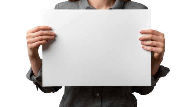 A woman is holding a blank piece of paper