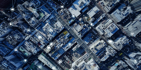 Aerial view of modern city with drone and communication network concept. Wide angle visual for...