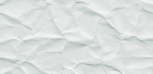 Fototapeta premium White crumpled paper texture background with shadows and highlights abstract design.premium paper texture photo for poster, banner, and pamphlet background