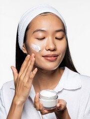 Woman Applying Cream on Face with Fresh Smile