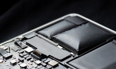 close up of Technician repairing electronic circuit board, repairing deteriorated battery, upgrade...