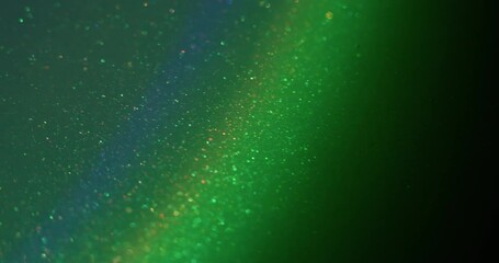 Defocused glow. Color light flare. Blur green blue illuminated gleam neon rainbow shimmer texture floating on abstract dark black art background. - Powered by Adobe