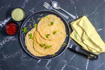Moong dal chilla is a savory Indian pancake made from ground moong lentils, spiced with herbs,...