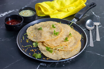 Moong dal chilla is a savory Indian pancake made from ground moong lentils, spiced with herbs,...