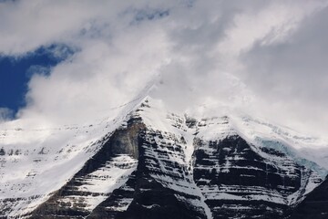 Snow-Capped Mountain Peak with Clouds