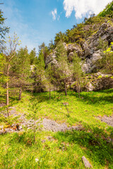 Fototapeta premium Hiking in Canyon in Prosiecka Valley near Kvacianska valley in Liptov region in northern Slovakia