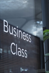 Business class sign at a modern airport terminal